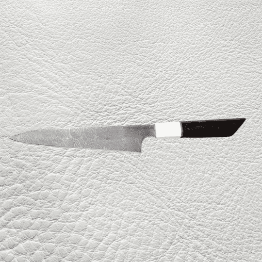 Custom kitchen knife with clean minimalist handle design