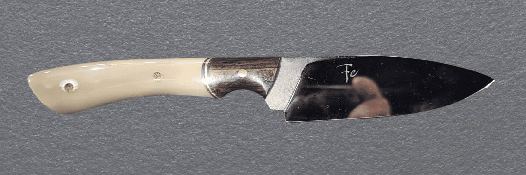 Handcrafted knife with resin handle