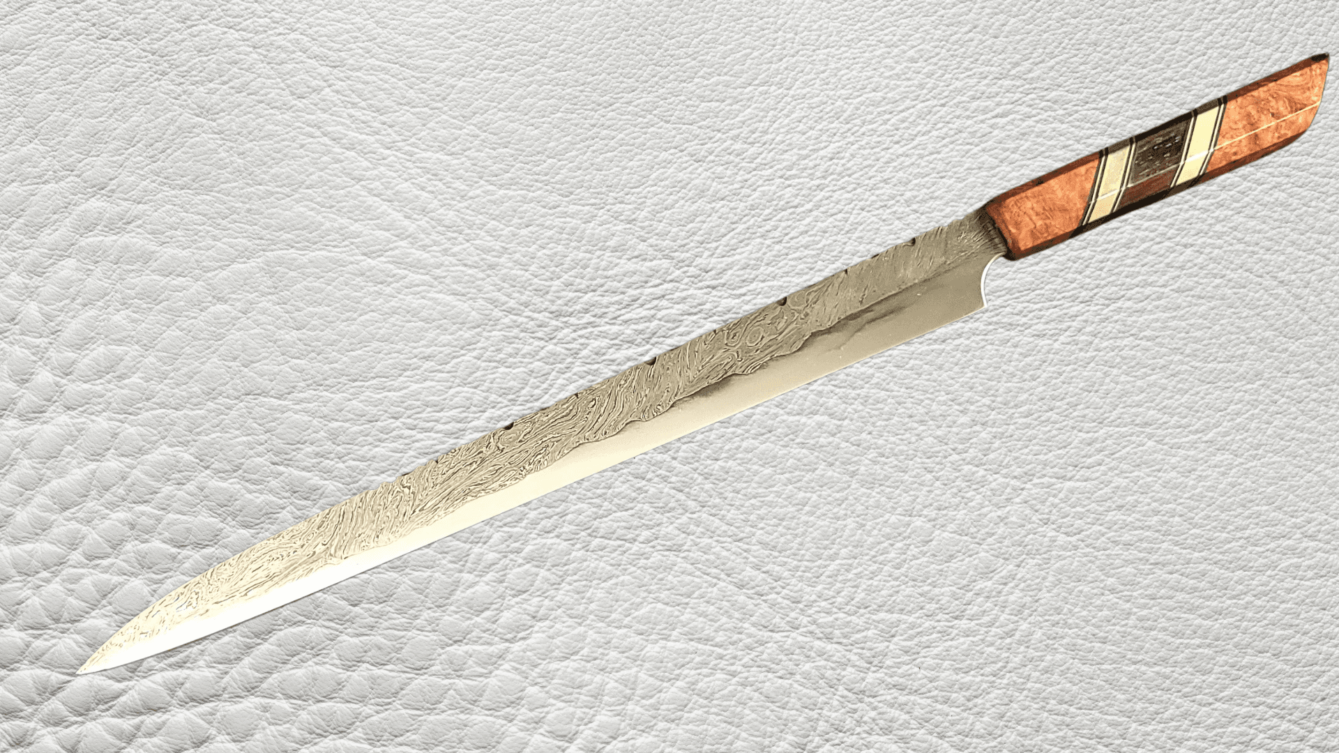 Handcrafted custom kitchen knives with decorative wooden handles